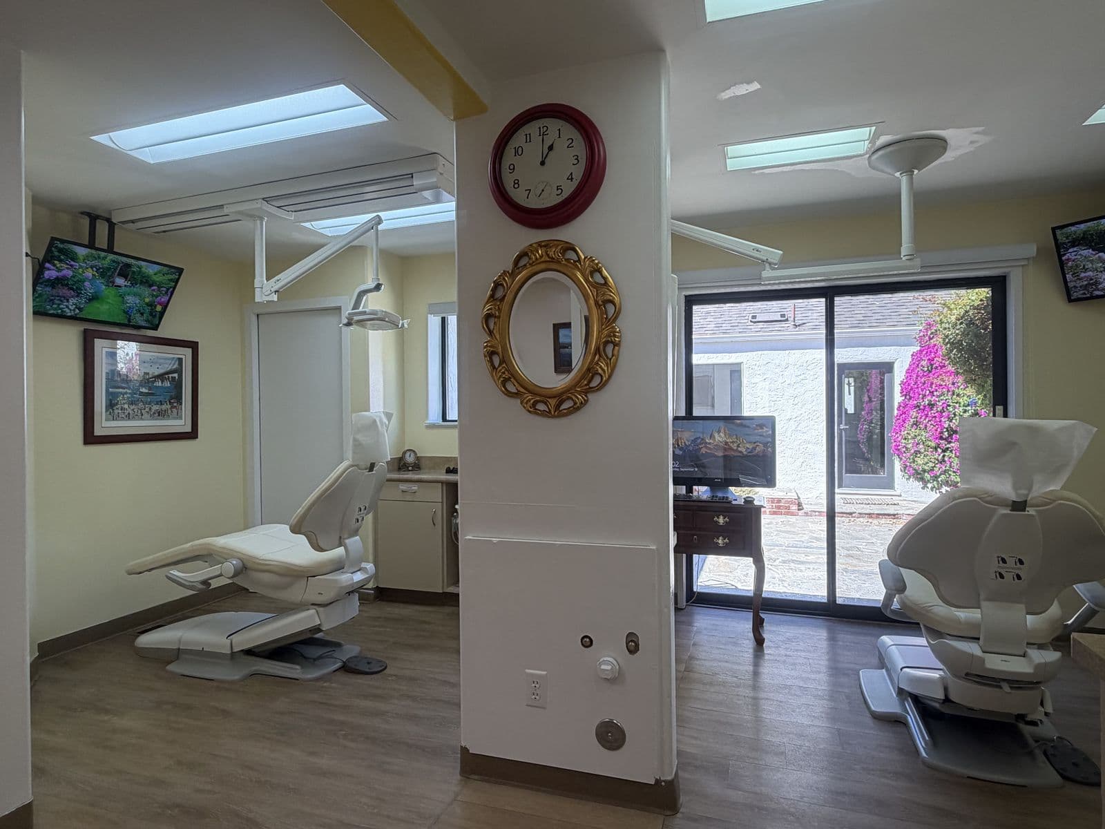 Two treatment rooms with dental chairs